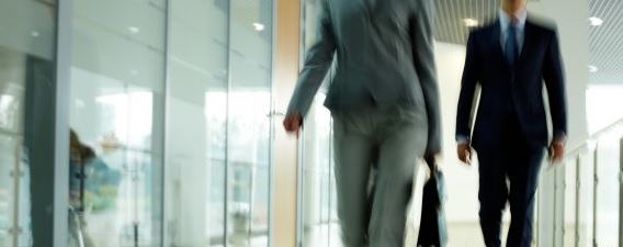 r-MAN-WOMAN-WALKING-OFFICE-large570
